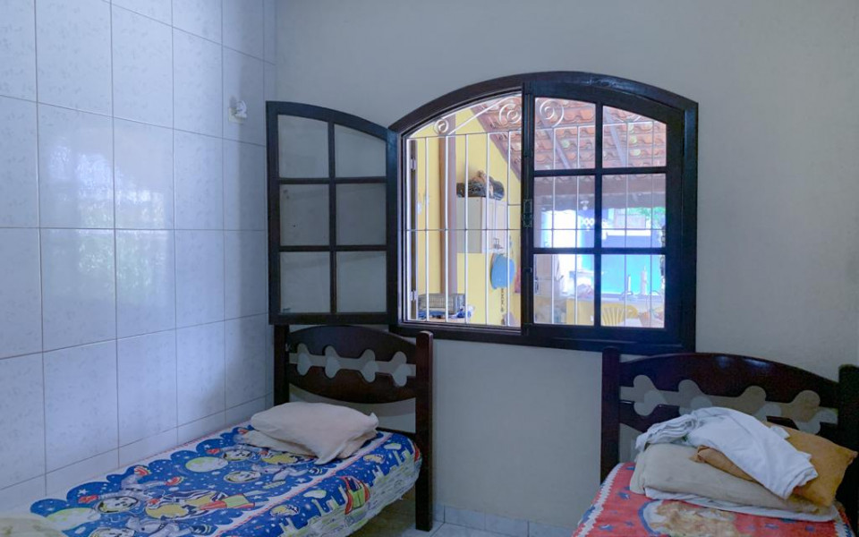 "Conforto urbano perfeito: casa 2 quartos c/ edícula, área gourmet, estacionamento 5 carros, centro